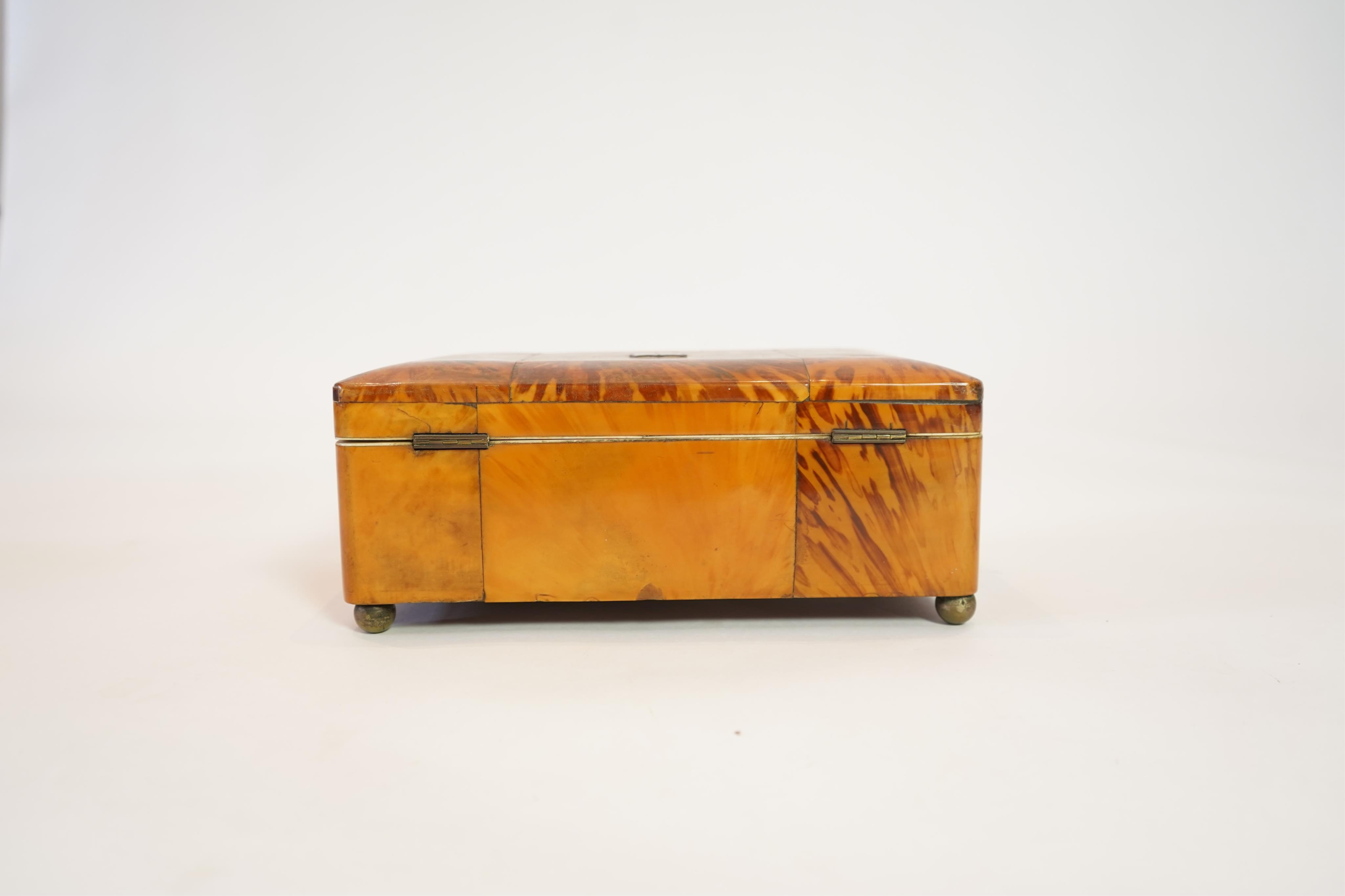 An early 19th century blonde tortoiseshell work box